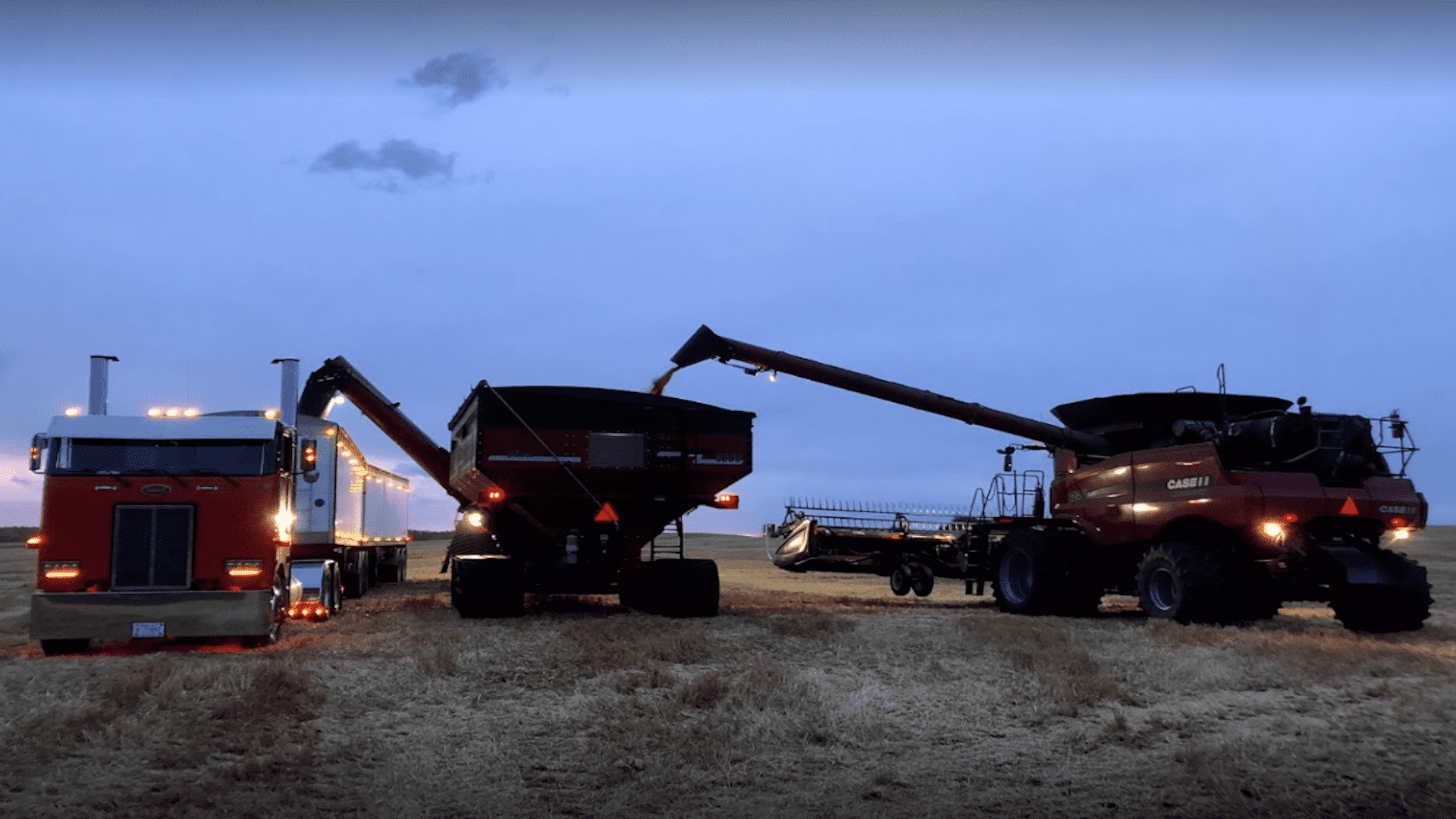 Three Hoppers operating in a field